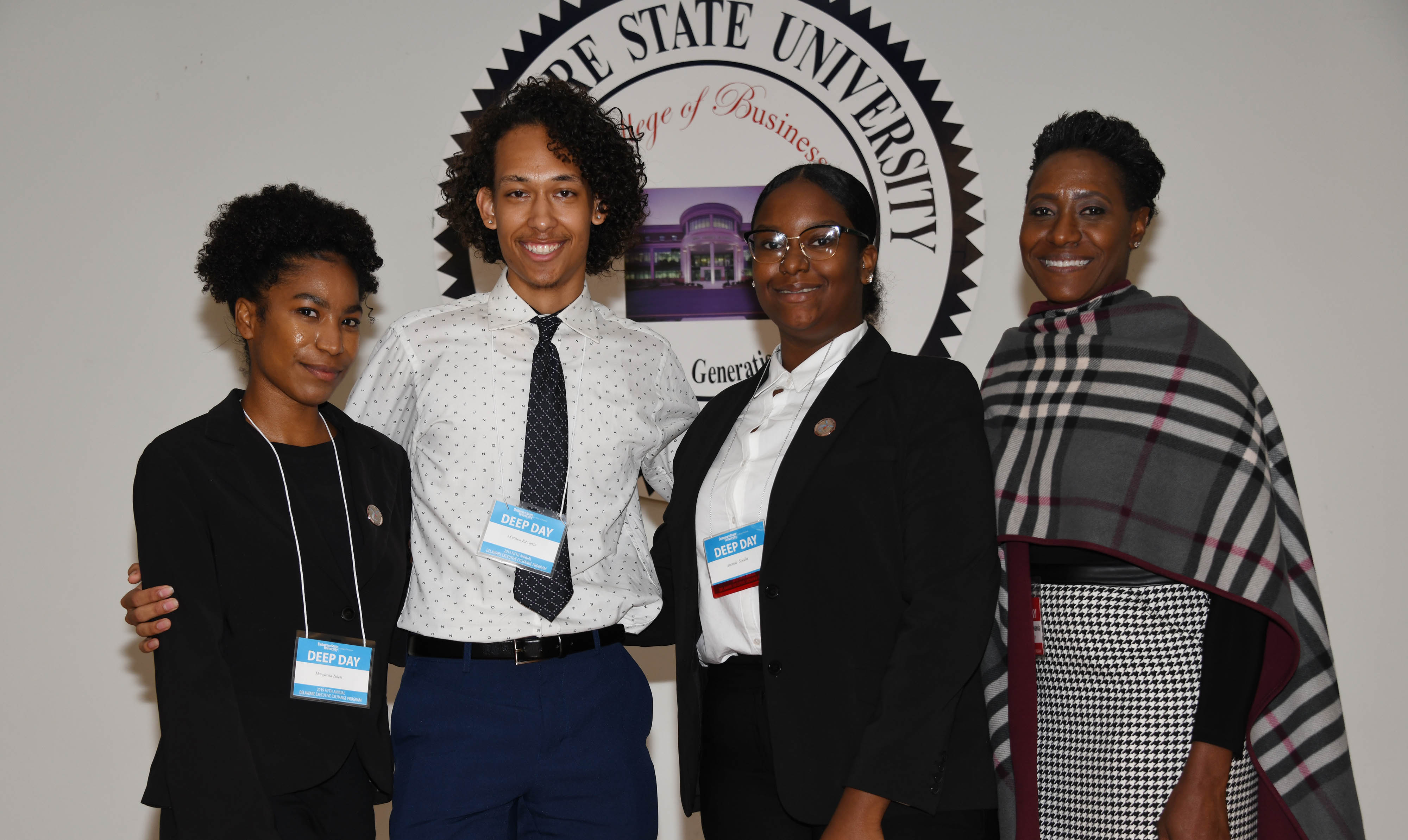 The Edwards Team won first place in the 2019 DEEP Day Business Case Competition. (L-r) Margarita Isbell, Madison Edwards, Anonda Speaks, and their coach Dr. Francine Edwards, dean of the College of Humanities, Education and Social Science.