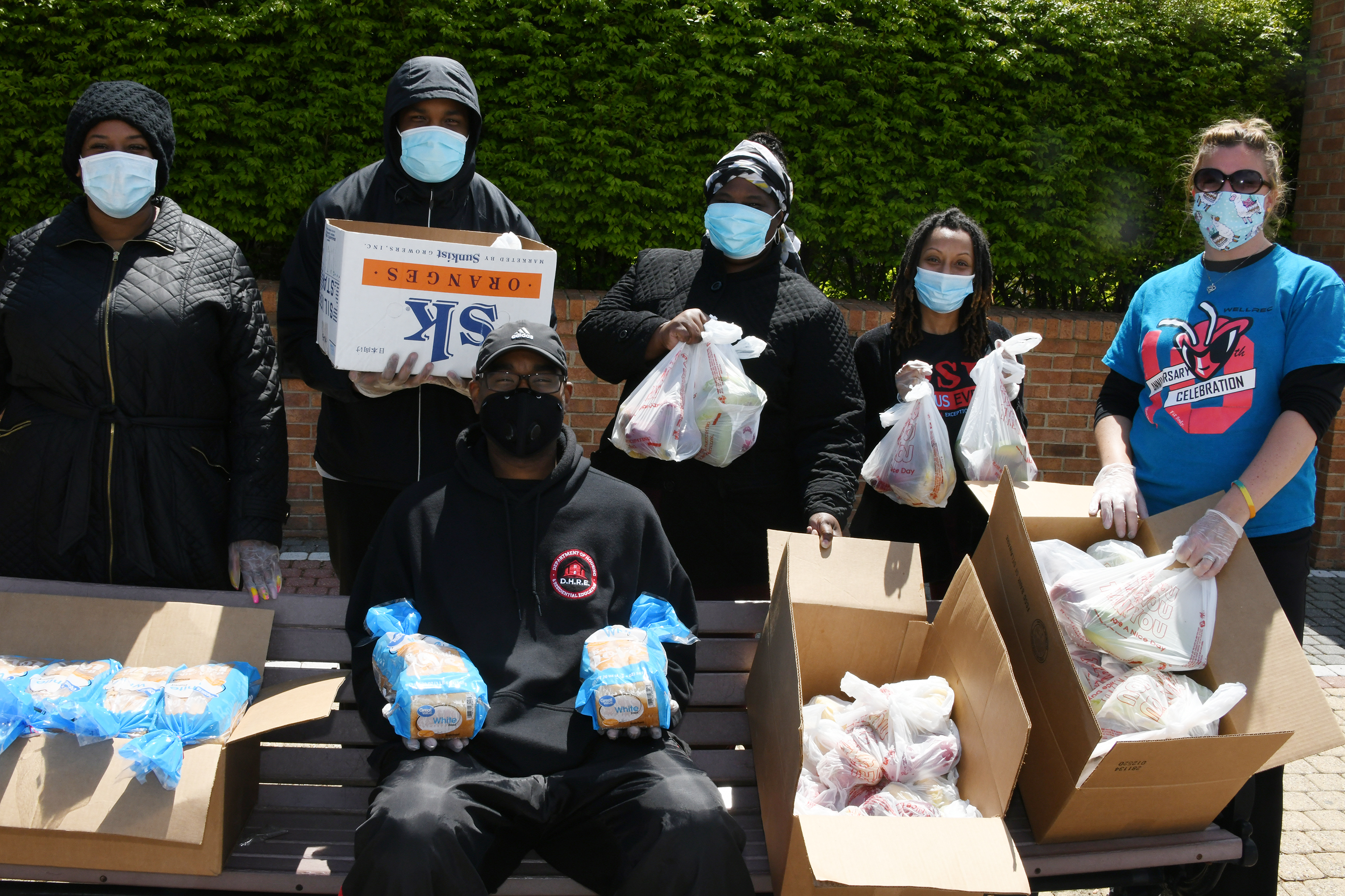 University Food Pantry volunteers show off some of the food they have available for students experiencing food insecurities amid the COVID-19 pandemic. Thirty-six students took advantage of the food giveaway on April 20.