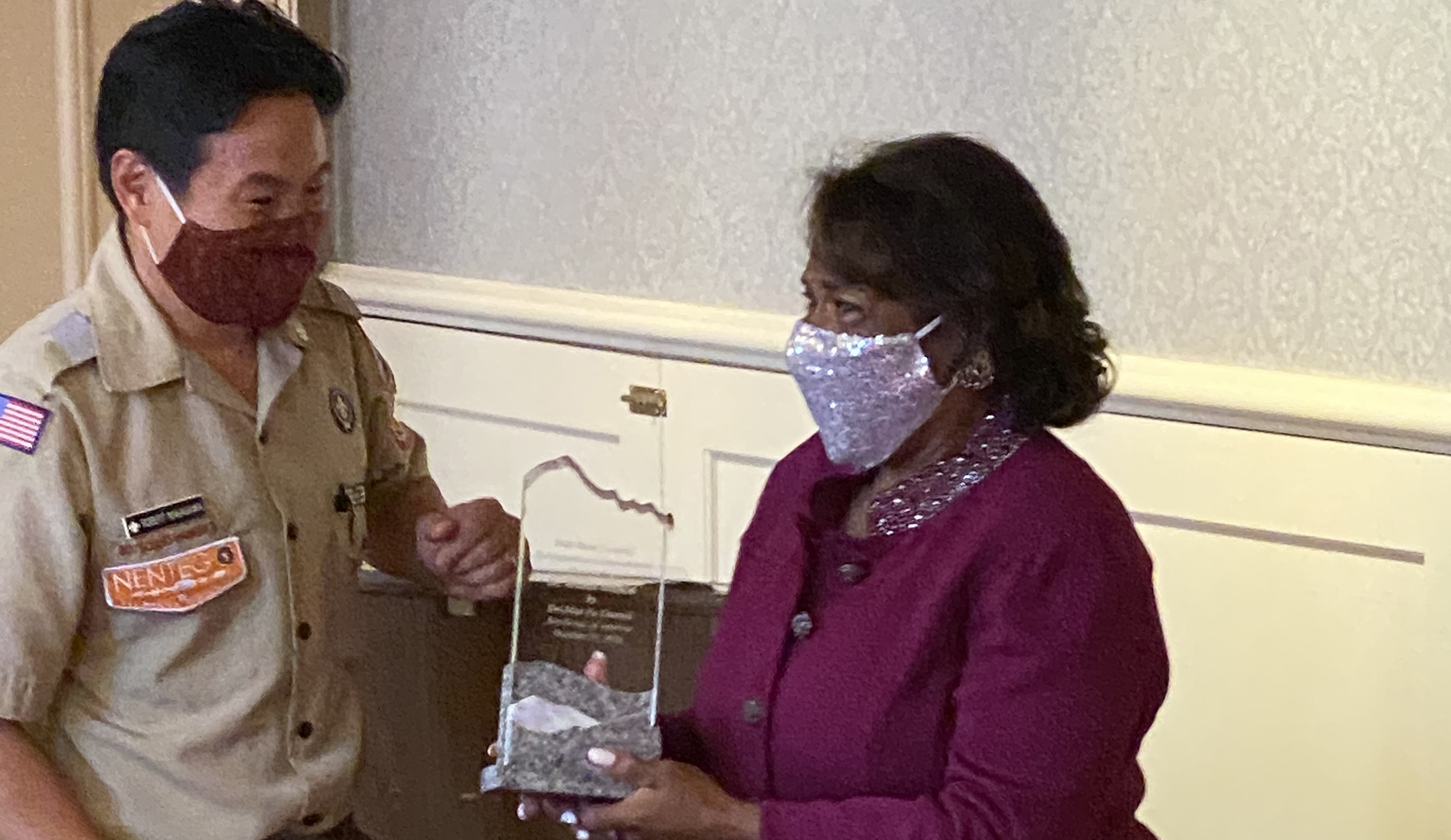 Robert Nakagawa, CEO of the Del-Mar-Va Council of Boy Scouts of America presents Dr. Wilma Mishoe with the organization's 2020 Distinguished Citizen Award.