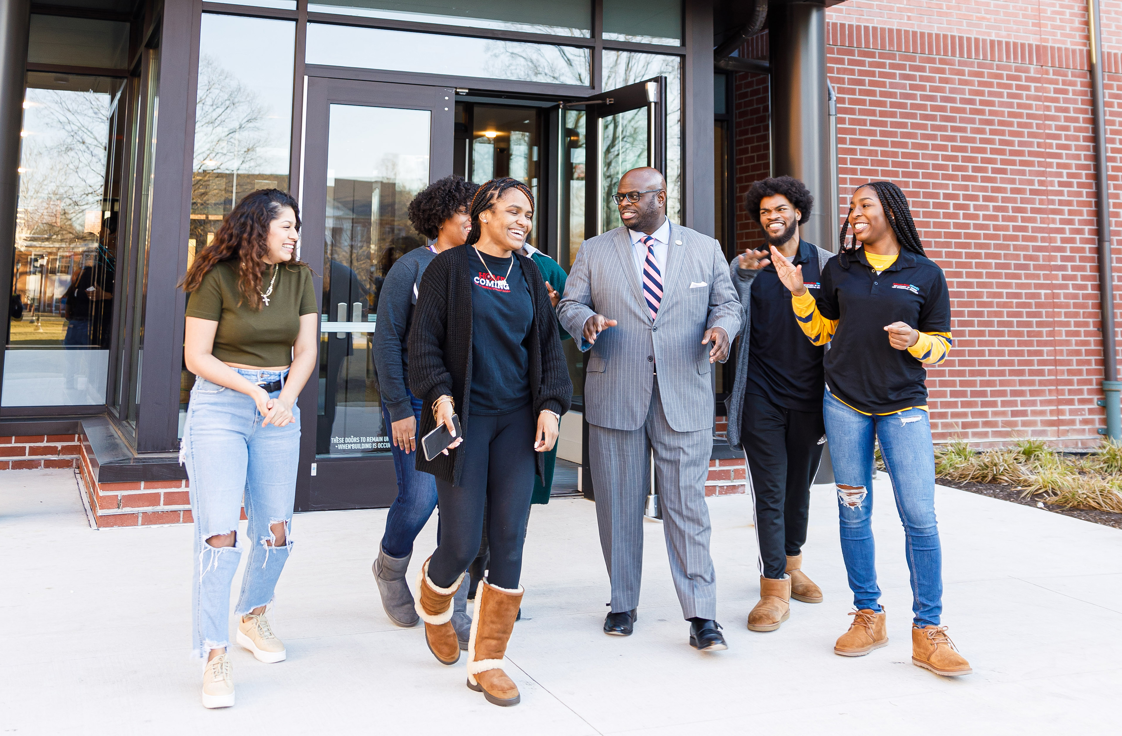 The historic gift will in part provide additional investment in the University endowment, as well as support the Del State Global Institute for Equity, Inclusion, and Civil Rights and the ongoing acquisition of Wesley College. University President Tony Allen is pictured with a group of Del State students -- who are representative of those that will benefit from scholarships from the increased endowment.