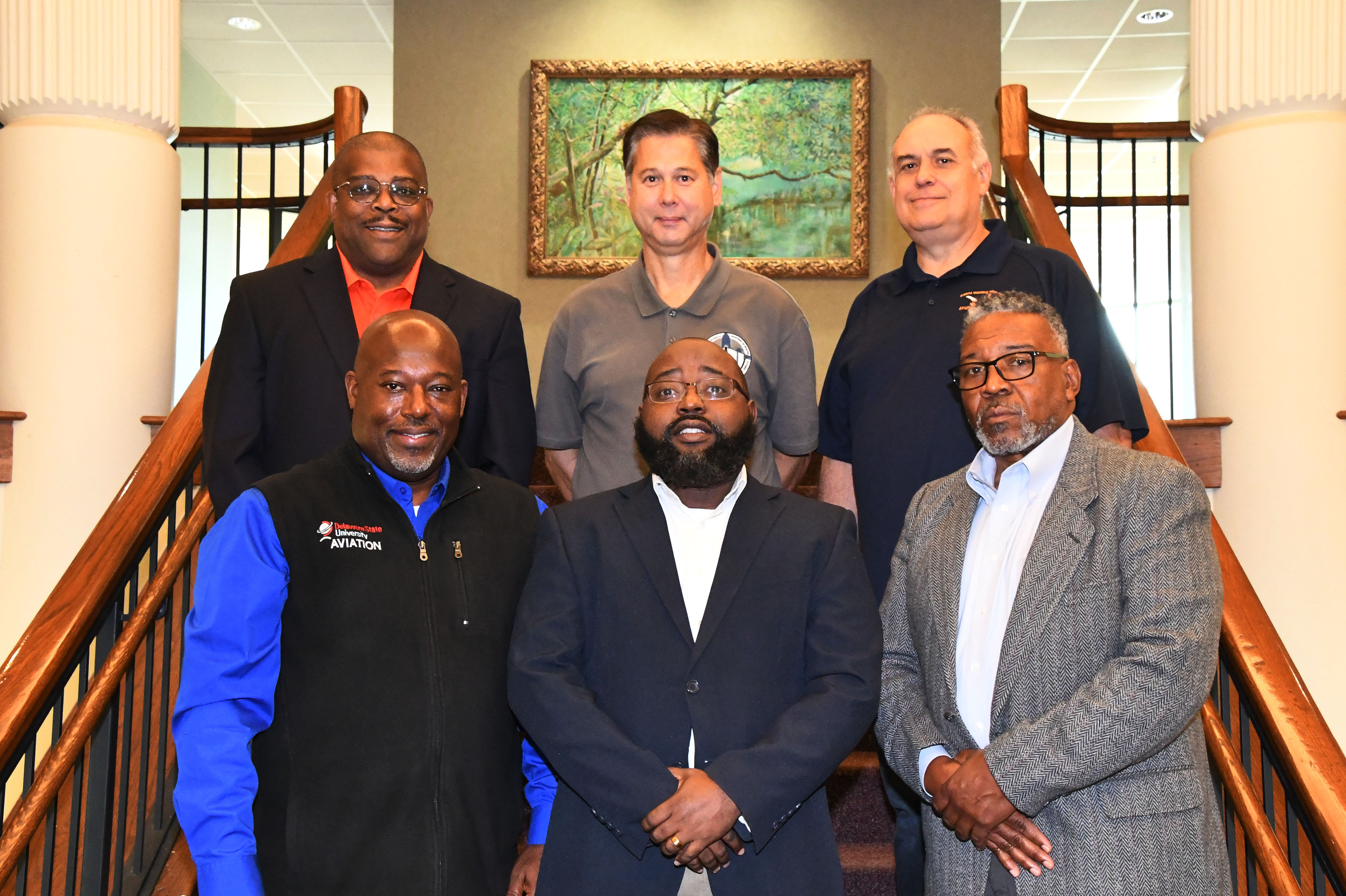 HBCU Aviation Directors -- (bottom l-r) Del State Lt. Col. Michael Hales, Dr. Willie Brown of UMES, Orestes Gooden of Elizabeth City State University; (top) Terence Fontaine of Texas Southern University, John Murray of Hampton University, and Jorge Guerra of Florida Memorial University -- all participated in the inaugural HBCU Aviation Directors Summit.