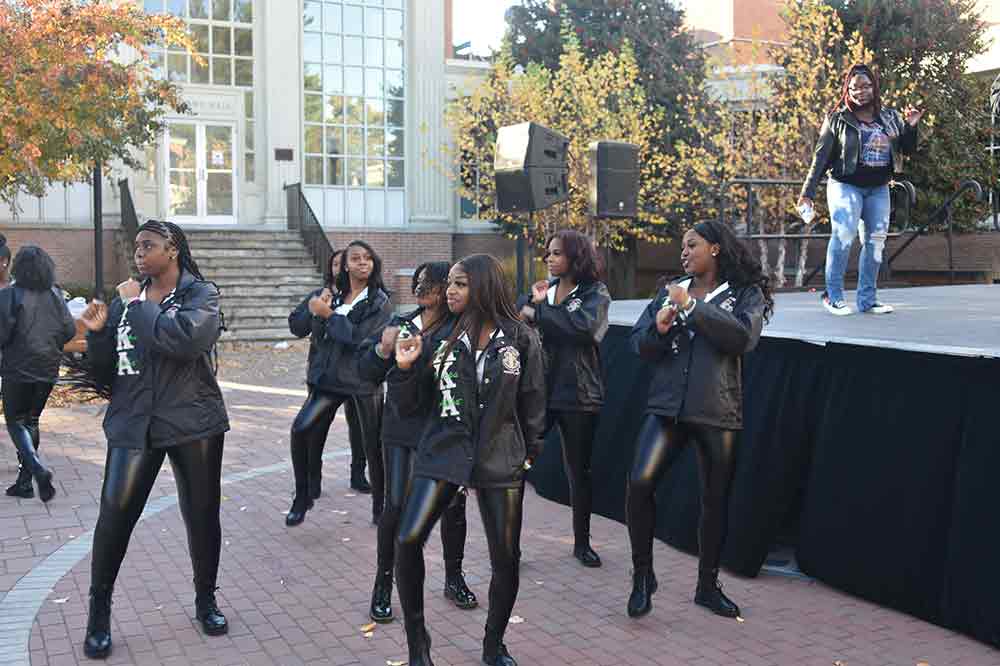 The AKA sisters get warmed up for their later step performance during the Hornetsgiving & Block Party event at DSU Downtown.