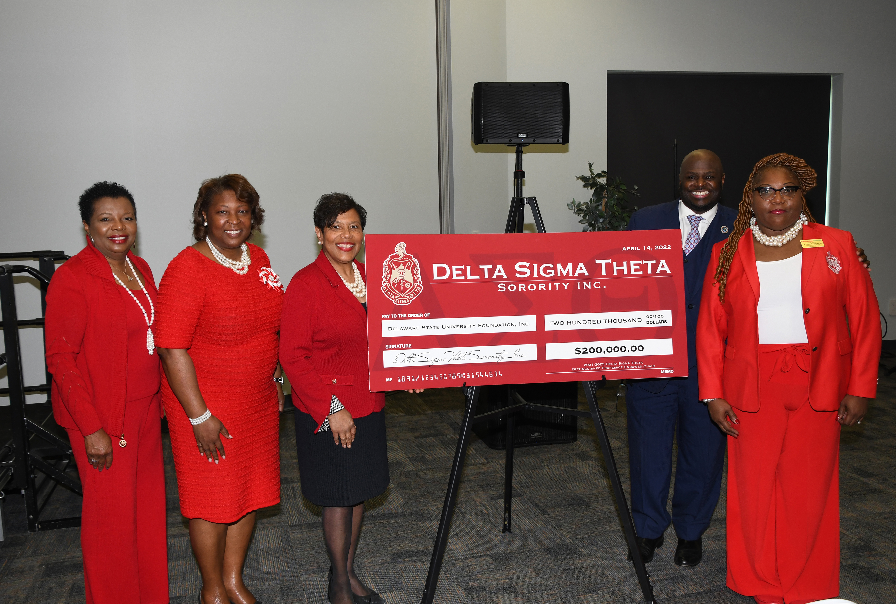 (L-r) Delta Sigma Theta's Dr. Thelma James Day (Distinguish Professor Committee Chair), Rosie Allen-Herring (Eastern Regional Director), Elsie Cooke-Holmes (National President), University President Tony Allen, and Dr. Gwen Scott-Jones, around a symbolic check for $200,000, which is part of the sorority's naming of Dr. Scott-Jones as a Distinguished Professor Endowed Chair. 