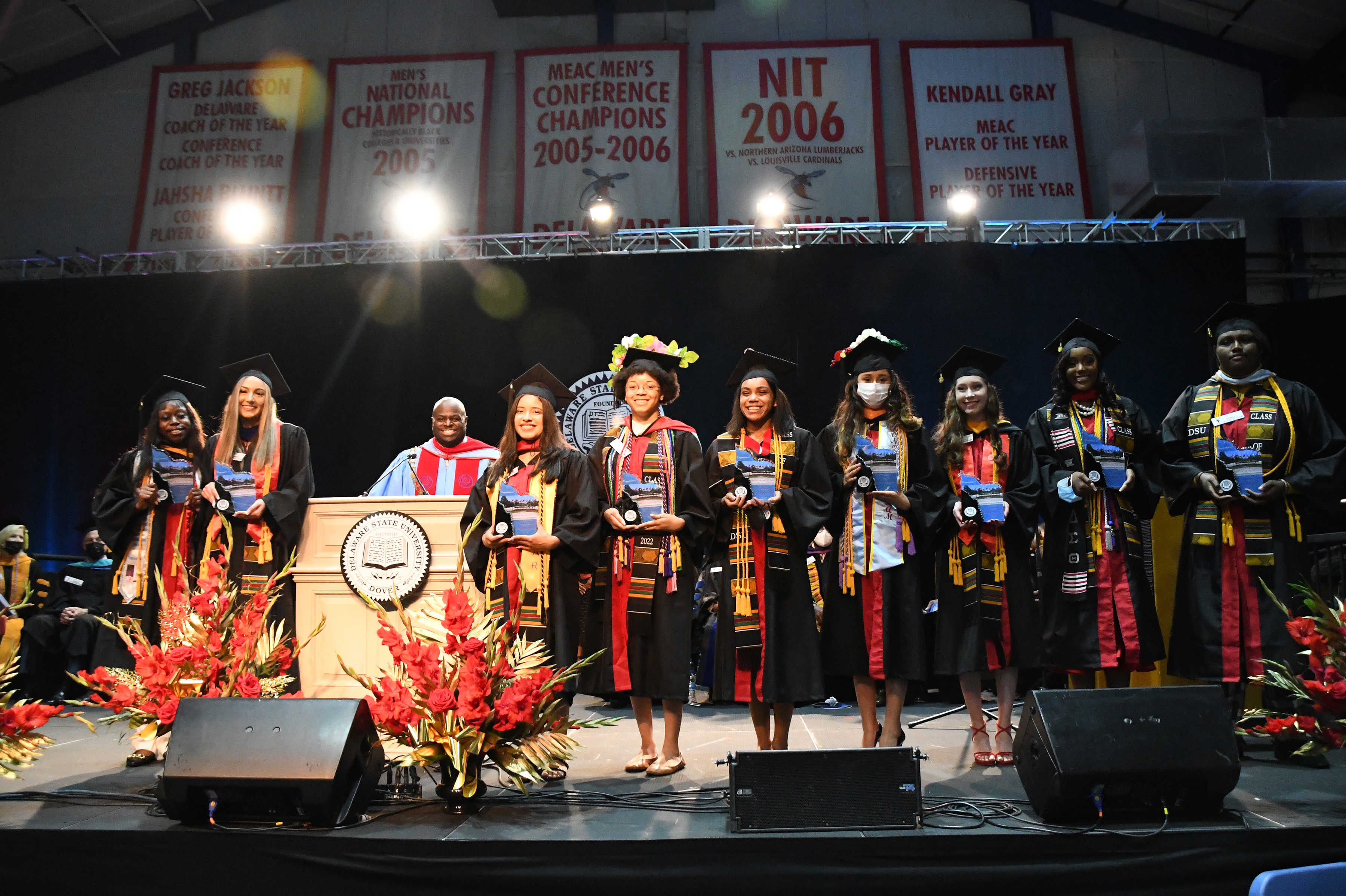 University President Tony Allen stands with nine Presidential Academic Aware recipients during the May 14 Undergraduate Commencement Ceremony. The recipients are listed in the below article.