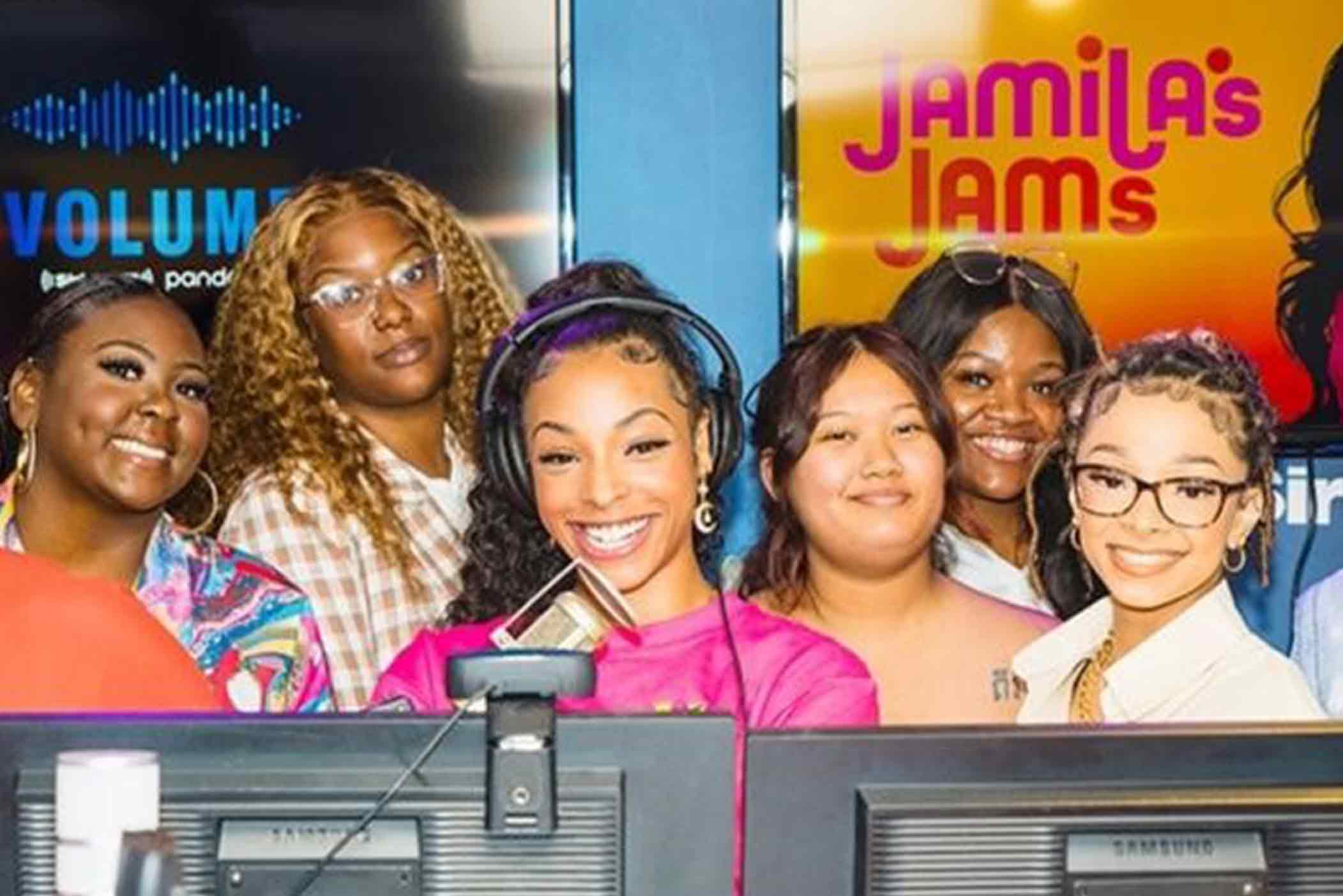 University alumna and Sirius Radio personality Jamila Mustafa poses with a group of Delaware State University students she invited to her show.