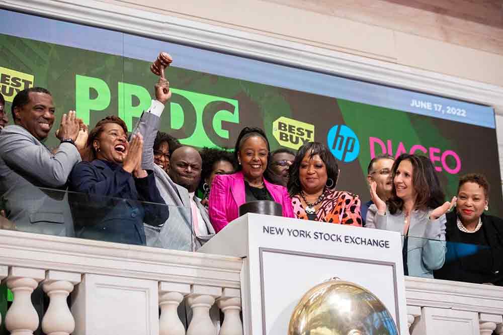 Dr. Tony Allen, Delaware State University President and Chair of the Board of Advisors for the White House Initiative on HBCU (holding up the mallet), and other HBCU presidents and representatives take part in the Closing Bell Ceremony at the end of the June 17 financial market day. 