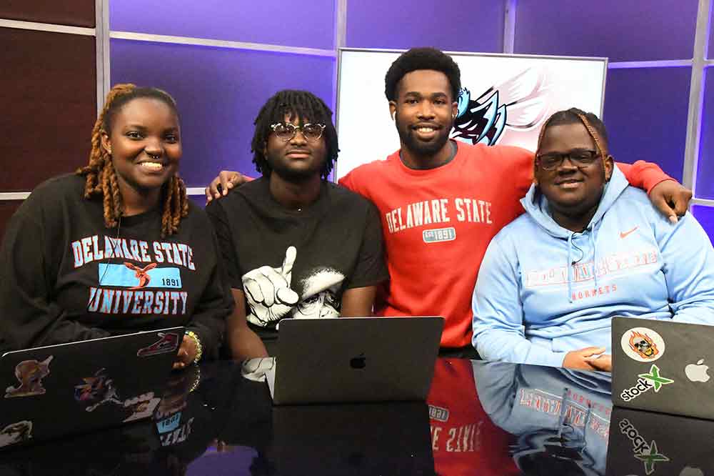 (L-r) Mass Communications majors Meleah Davis, Amadou Sow, Sherman Gay and Rashaad Lathern have launched "The Real Buzz," a sports podcast.