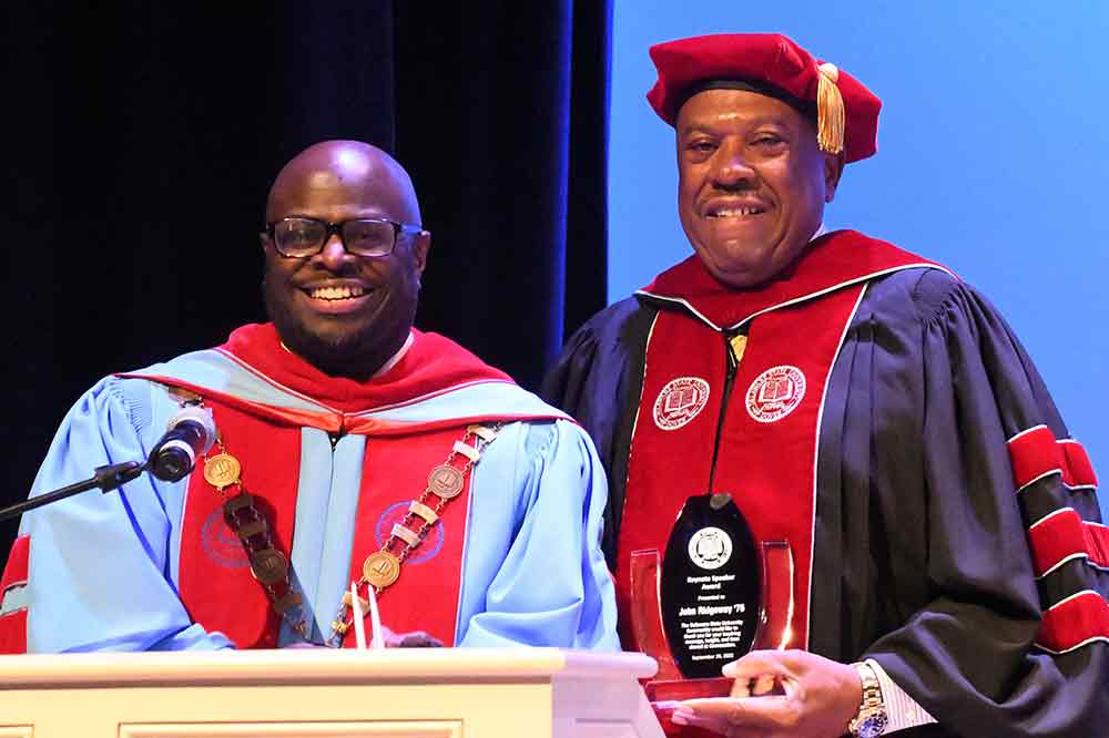(L-r) University President Tony Allen presents John Ridgeway, alumnus and Vice Chair of the University's Board of Trustees, with the Keynote Speaker Award. Mr. Ridgeway spoke as the keynote speaker during the Sept. 29 Convocation Ceremony