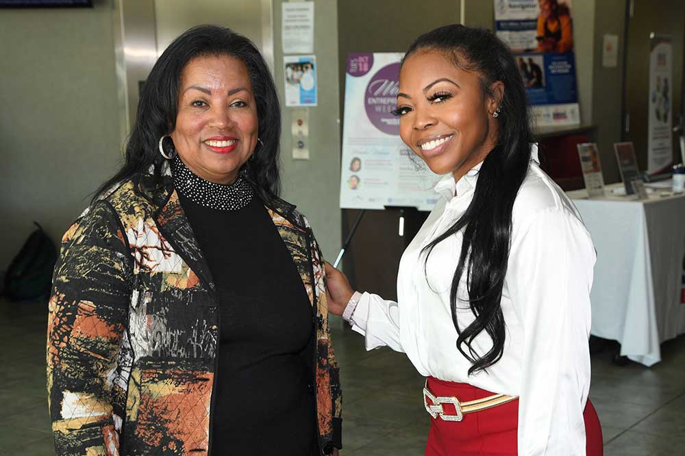 (L-r) Dr. Devona Williams, founder/CEO of Goeins-Williams Associates and Chair of the University Board of Trustees, and Jada Robinson, University master's degree candidate and founder/CEO of Aquarius Cosmetics, LLC, shared their business experiences during "Fireside Chat" interviews at the Oct. 18 Women's Entrepreneurship Week program held in the Bank of America Building.