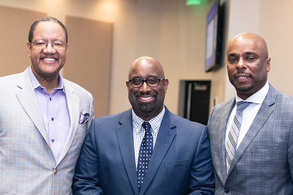 (L-r) Michael Strautmanis, Executive VP for External Affairs for the Obama Foundation and one of the Impact Conference keynote speaker, Dr. Sonel Shropshire, Associate Vice President of the College of Business' Global Institute for Equity, Inclusion and Civil Rights, and COB Dean Michael Casson.