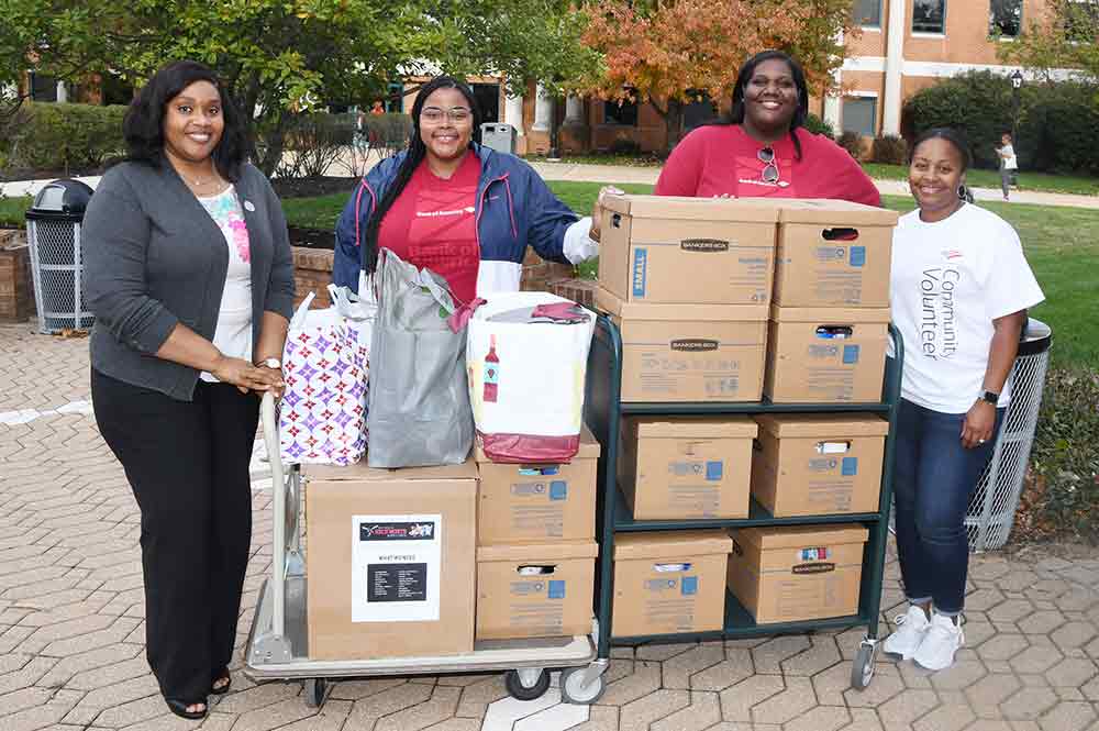With the donated items are (l-r) Dr. Jarso Saygbe, Associate Vice President of the Office of Student Success, along with Bank of America's Black Professional Group's Aurellia Maxam, Brandi McCollum and that organization's Vice President Crystal McKay.

