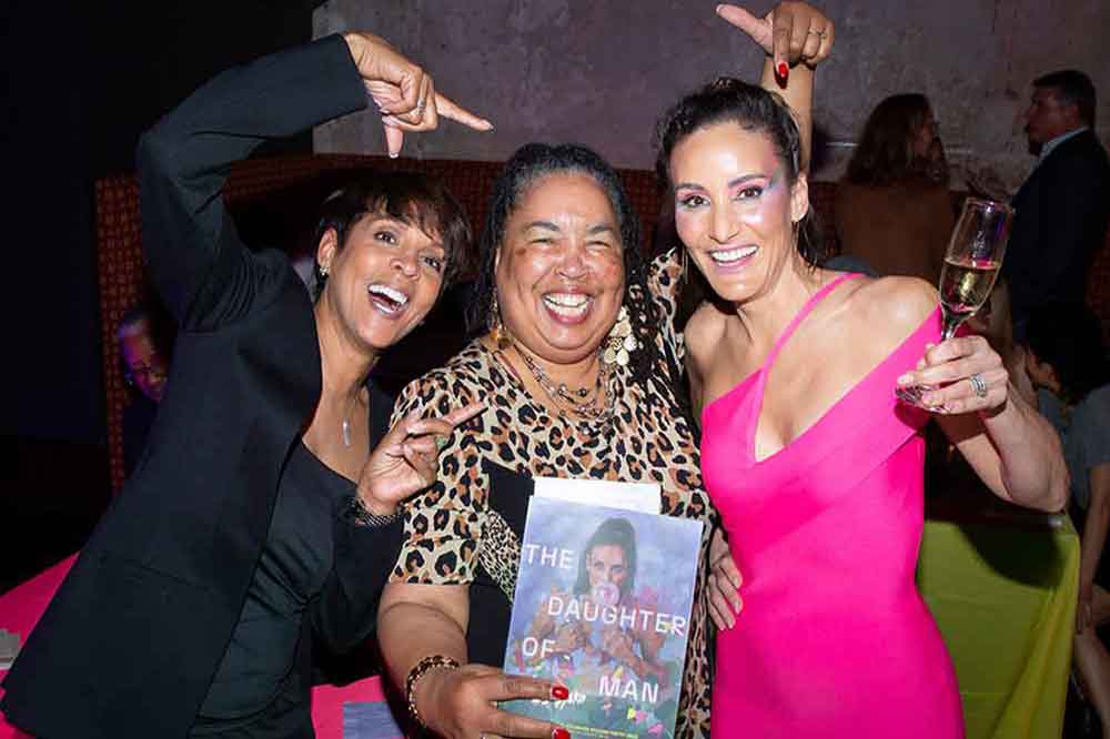 L.J. Sysko (far right), University Director of Executive Communications, celebrates the debut of her poetry book "The Daughter of Man" and its recognition as part of National Poetry Month, along with University colleagues Dr. Dawn Mosley and Dr. Linda Murray-Jackson at the official launch of the works on April 29 at The Queen in Wilmington, Del.