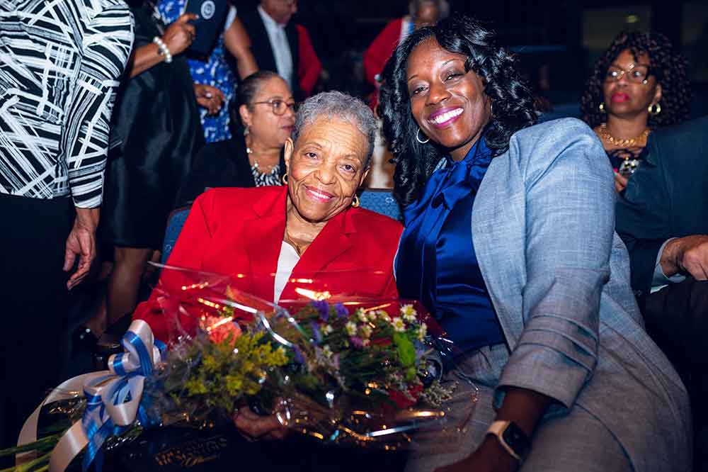Mrs. Vermell DeLauder (l) poses with Delaware State University First Lady Tara Allen just before the ceremony that officially renamed the performing arts site on campus the William B. DeLauder Education and Humanities Theatre in honor of the institution's eighth president.