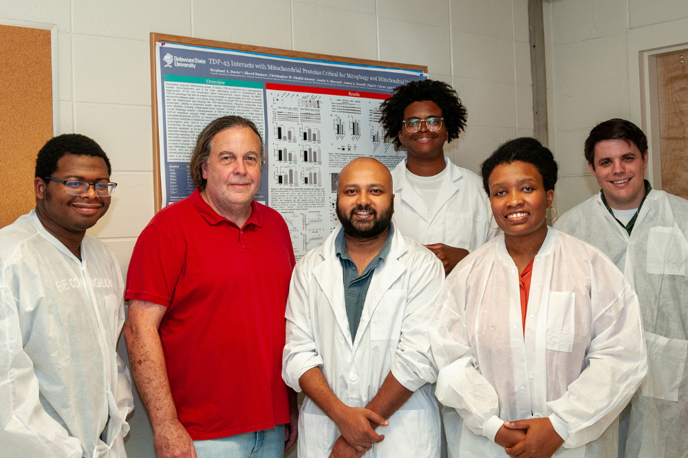 (L-r) The Alzheimer research team: (l-r) Tyler L. Petersen, Dr. Michael A. Gitcho, Muhammad I. Abeer, Isaiah N. Brooks, Juneessa M. Pressley, and Matthew B. Dopler. The work of these researchers -- led by Dr. Gitcho -- has receives a $500,000 donation from the Paul H. Boerger Fund of the Delaware Community Foundation.