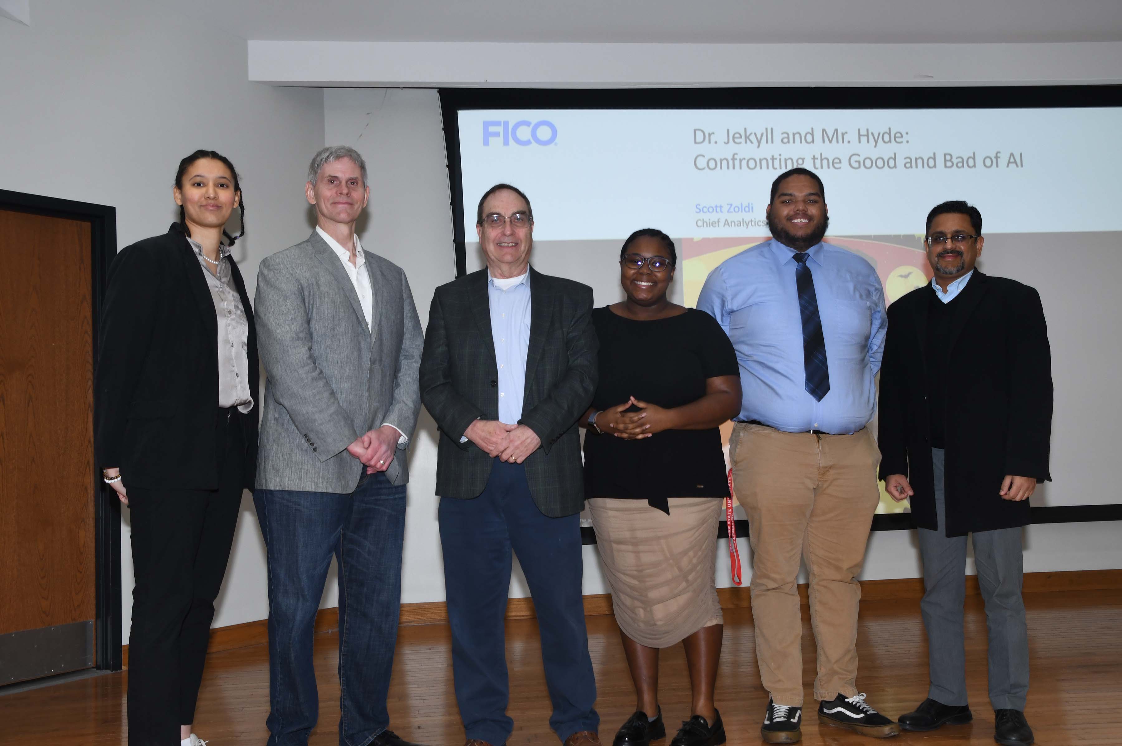 (L-r) DSU student Lydia Daids, FICO Chief Analytics Officer Dr. Scott Zoldi, Visiting Professor Dr. Derald Wentzien, DSU students Deena Johnson, Amir Conwell and College of Business Associate Dean Praveen Pinjani. The three DSU students each represent the three team that will compete in FICO's 12-week Educational Analytics Challenge competition. 