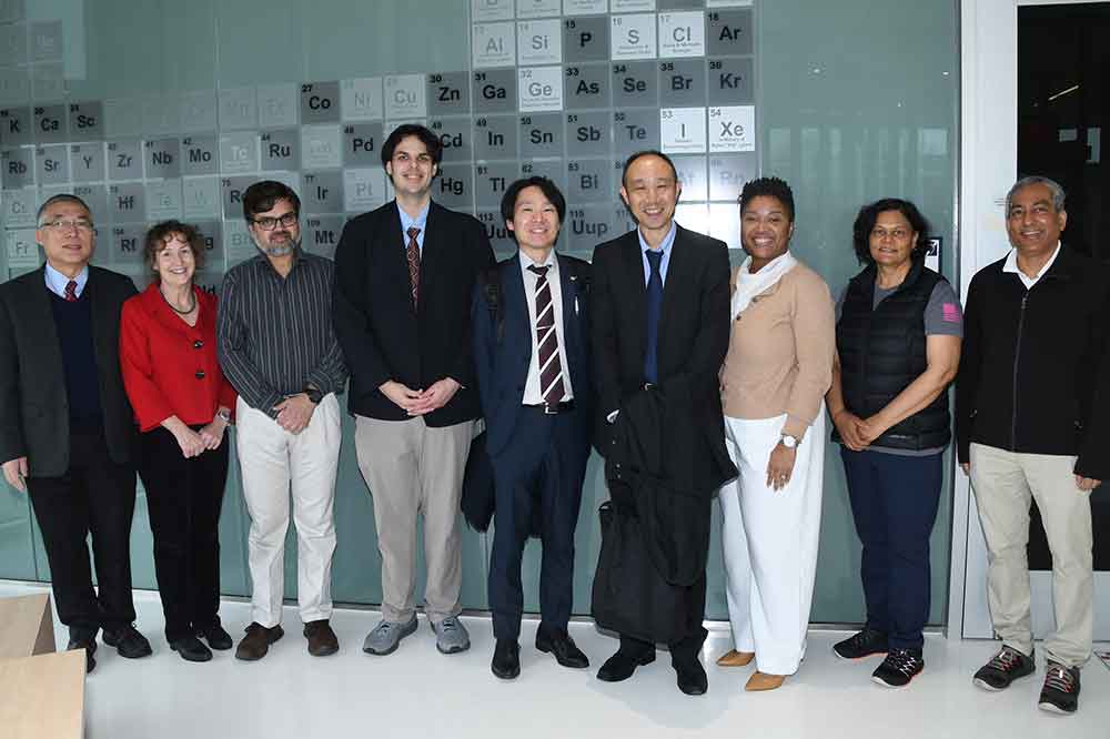 DSU's Fengshan Liu, Dr. Melissa Harrington, Dr. Mohammed Khan, Japanese interpreter, Japan's Kenta Sunaga and Yoshitaka Endo, Dayna Cobb of DNREC, DSU's Dr. Renu Tripathi and Dr. Gour Pati document the visit with a photo moment.