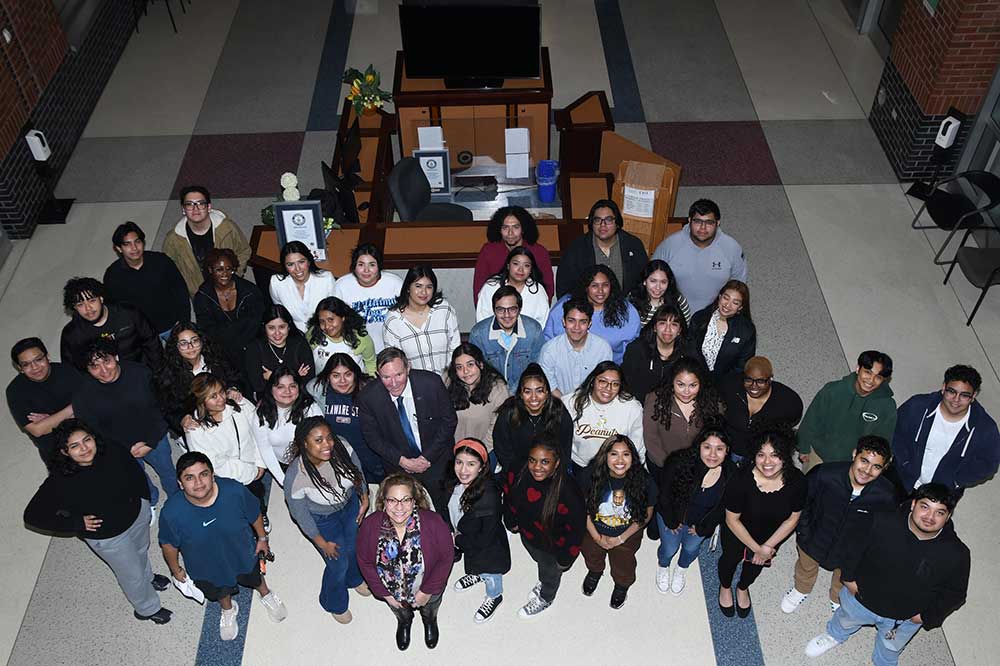 A group of the DSU Dreamers students and Don Graham, the founder of the Opportunity Scholar that has made it possible for them to earn a college degree, come together for a group photo.