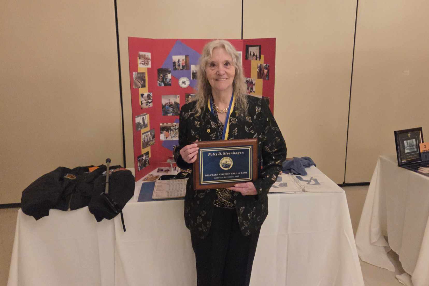 Dr. Polly Steenhagen poses with her Hall of Fame plaque.