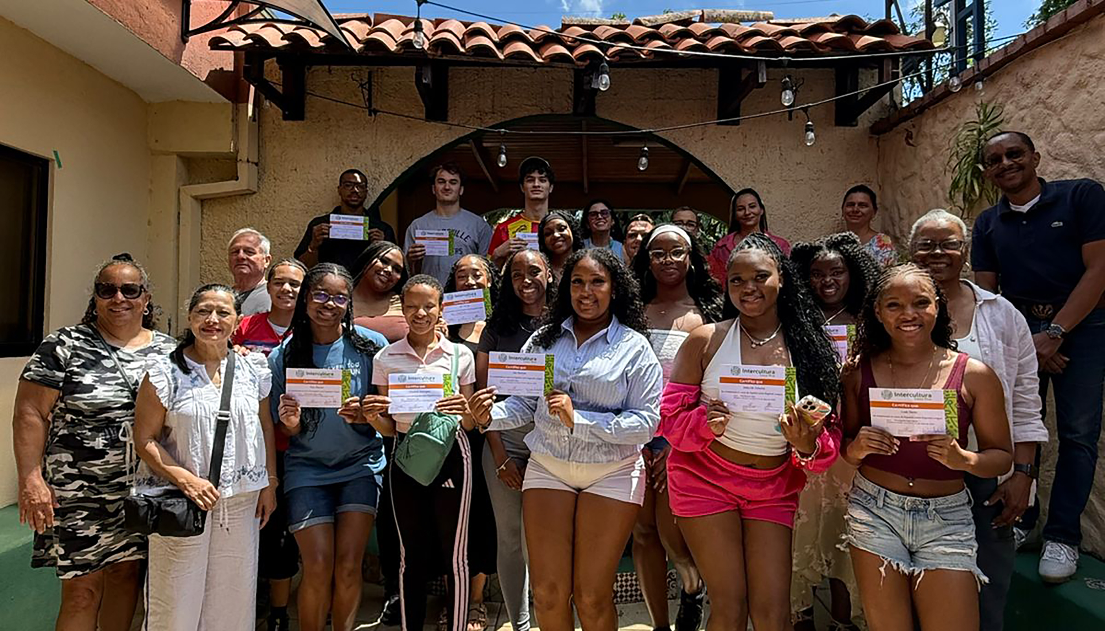 A group of DSU students show off their language certificates they earned as part of their recent Spanish immersion experience in the Central American country of Costa Rica.