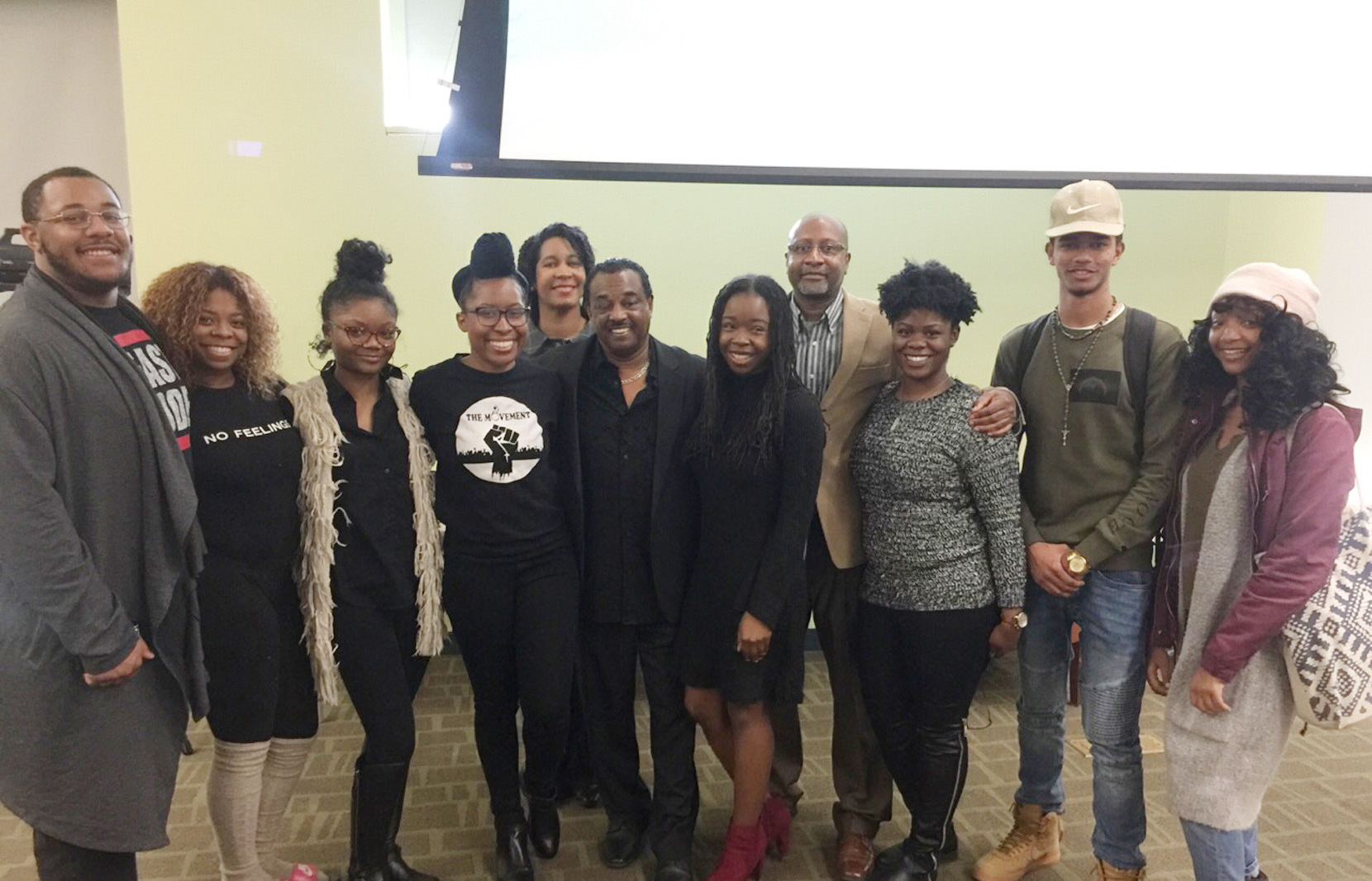 Robert "Kool" Bell (center in black) takes a photo opp moment with students and faculty during his Feb. 21 visit to DSU.