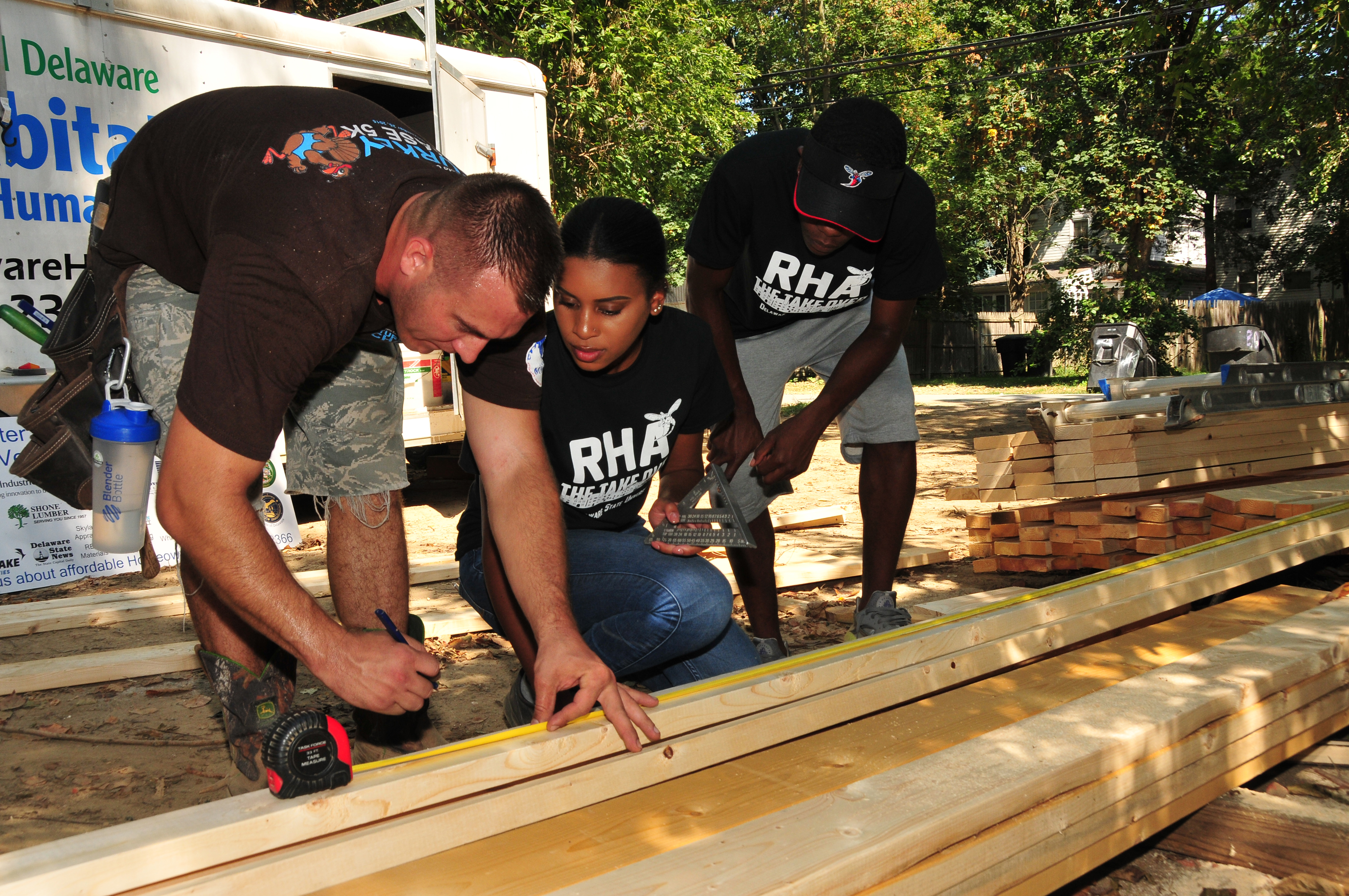 The photo of DSU Residential Housing Association students working with Habitat for Humanity in the fall 2016 shows the spirit "Of Service" that Dr. Tony Allen describes at DSU in this editorial.