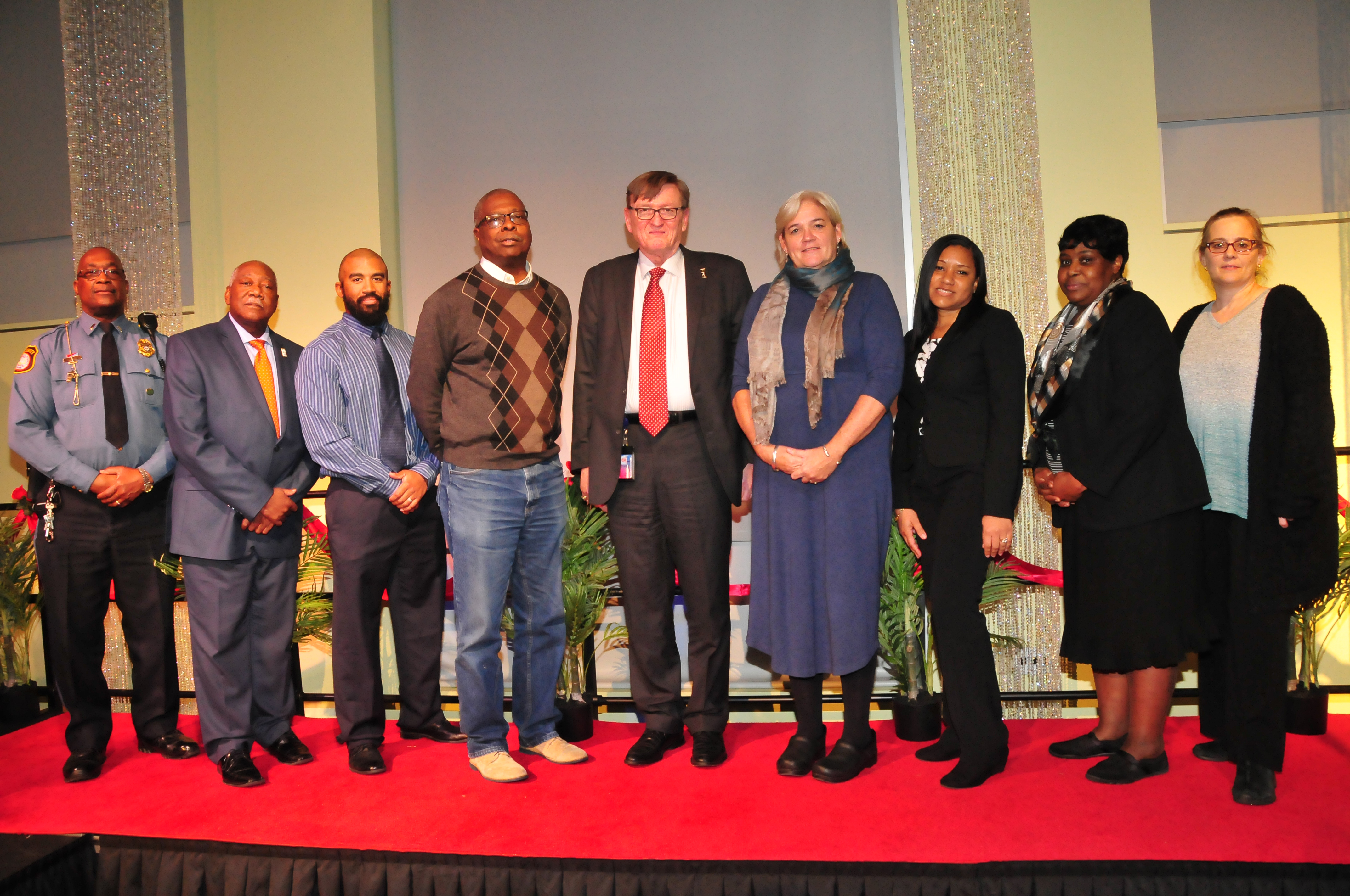 Delaware State University’s 2017 Vice Presidents Choice Award recipients: (l-r) Lt. Russell Smith, Bryant T. Bell, Joel Welsh, Dennis Jones, Dr. Bradley Skelcher, Dr. Alexa Silver, Jadeen Notice, Henrietta Savage and Crystal Canon. 