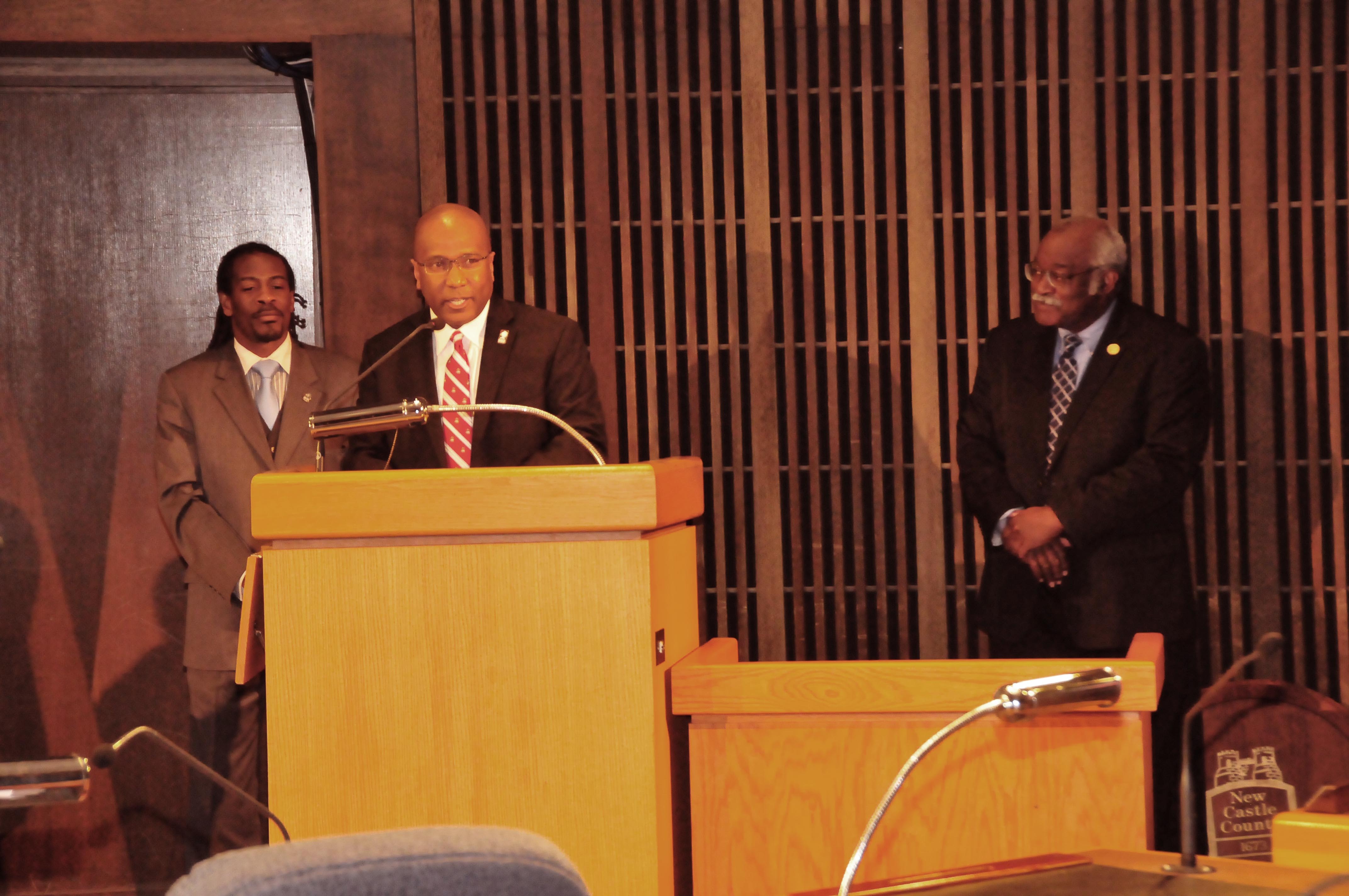 Dr. Harry L. Williams expresses his gratitude to the Wilmington City Council for its unanimous resolution honoring him. Flanking him are Councilman Nnamdi O. Chukwuocha and Councilman Sam Guy, both DSU alumni, Class of 1996 and Classes of 1981 and 1984, respectively.