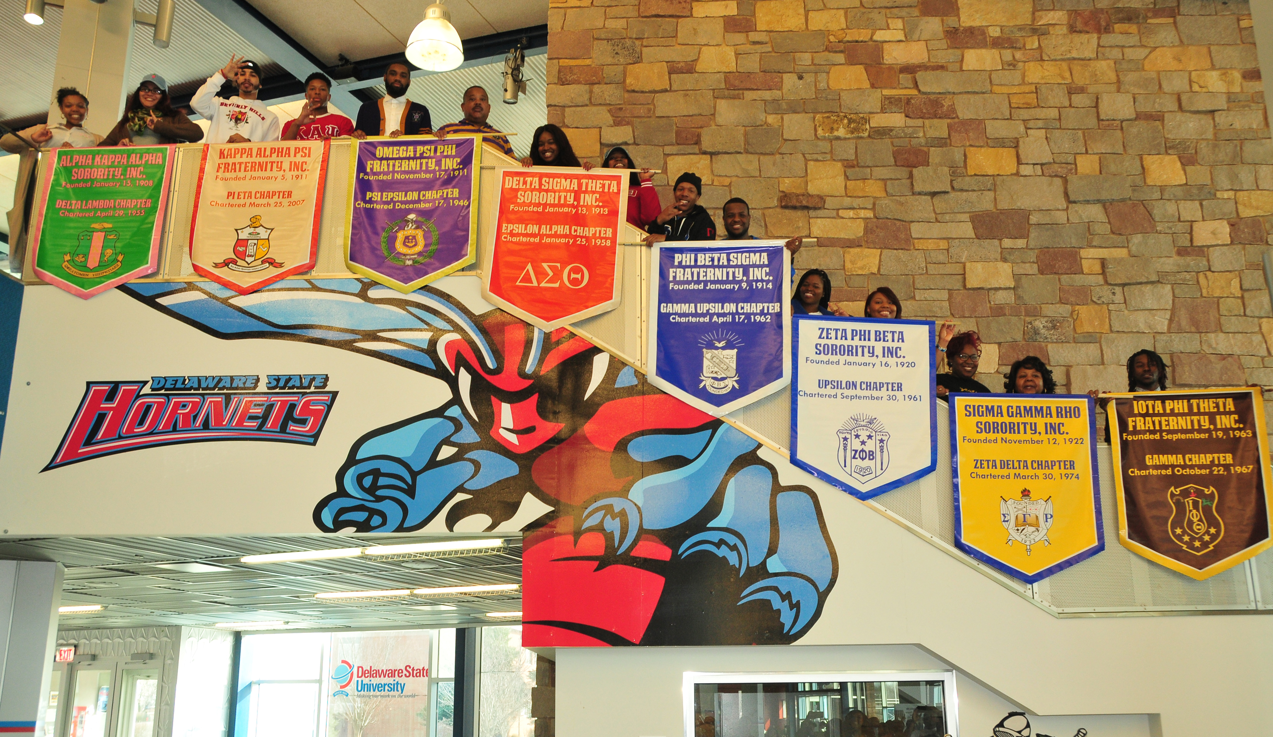 The Divine Nine fraternities and sororities show off their banners that will be hung in the MLK Jr. Student Center.