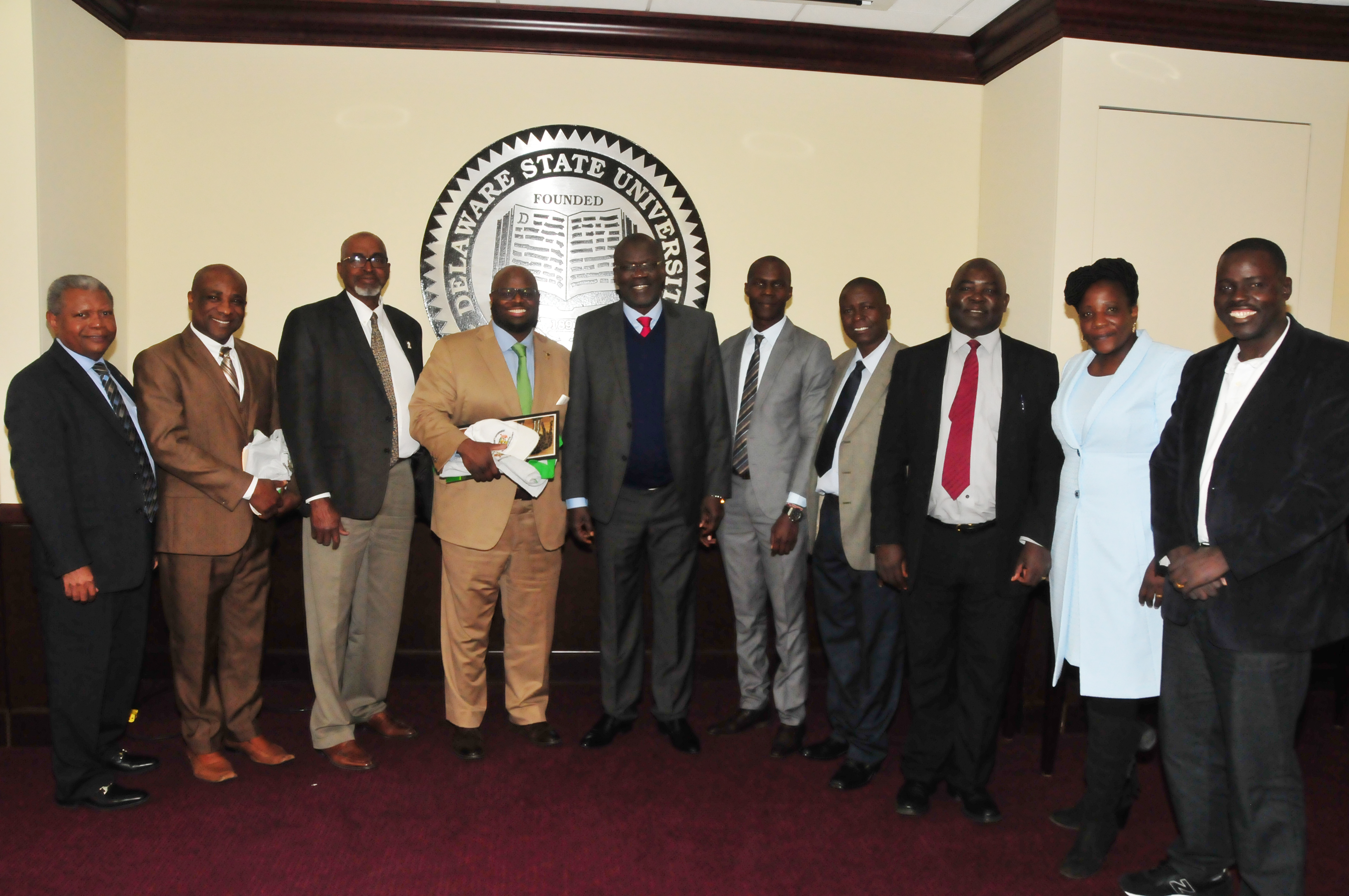 (L-r) Dr. Marikis Alverez, Dr. Samuel Besong, Dean Dyremple Marsh, Provost Tony Allen, Gov. Cornel Rasanga, along with his delegation, Walter Okello, Charles Ogada, Hon. Nick Ochula, Pauline Precious and Anthony Omondi.