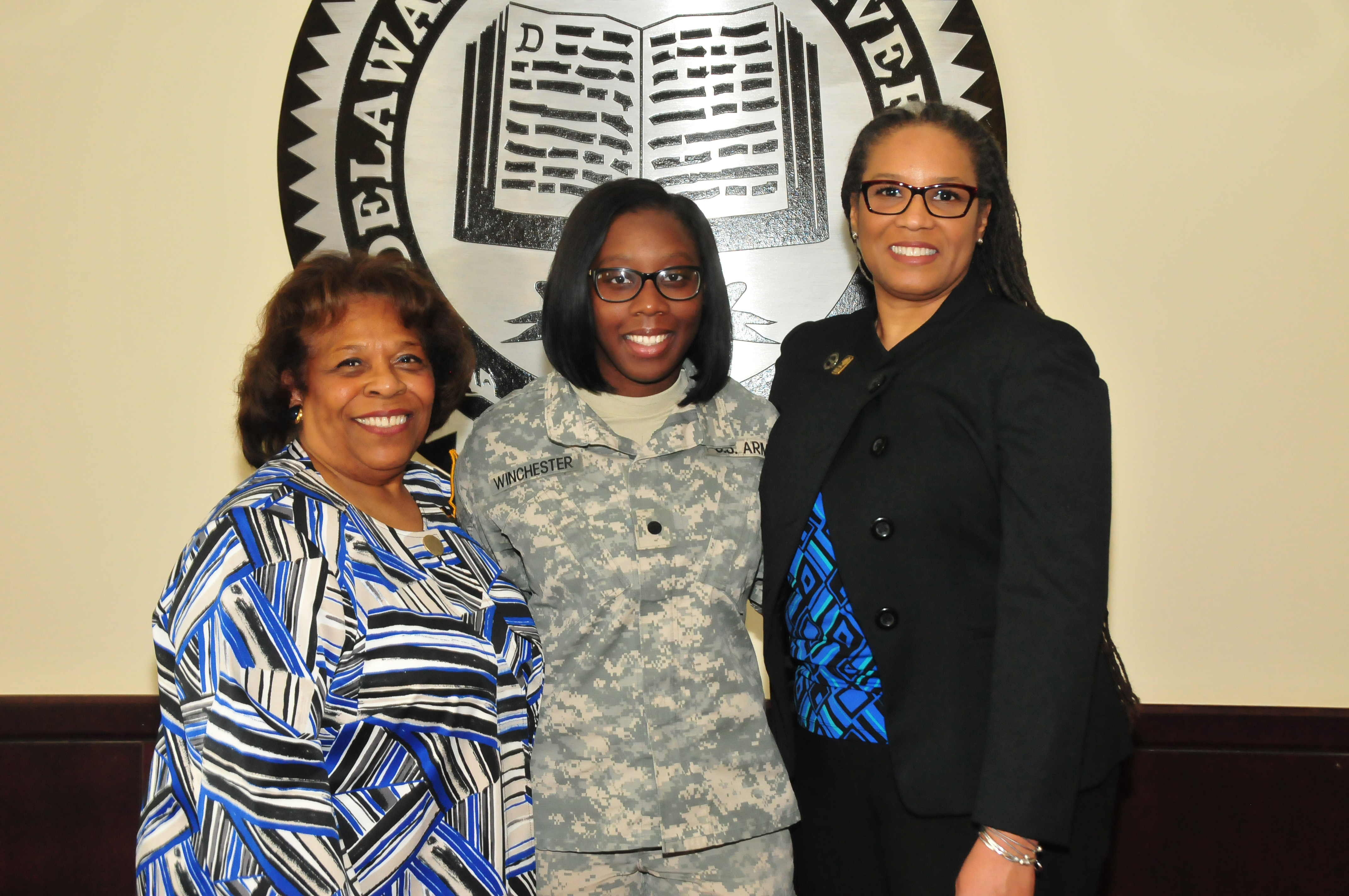 Alisa Winchester (center), a junior English major, stands with DSU Acting President Wilma Mishoe (l) and Dr. Adenike Davidson, professor of English. Just before the photo, Dr. Mishoe informed Ms. Winchester, also a ROTC cadet, that she has been awarded the prestigious Harry W. Truman Scholarship. 
