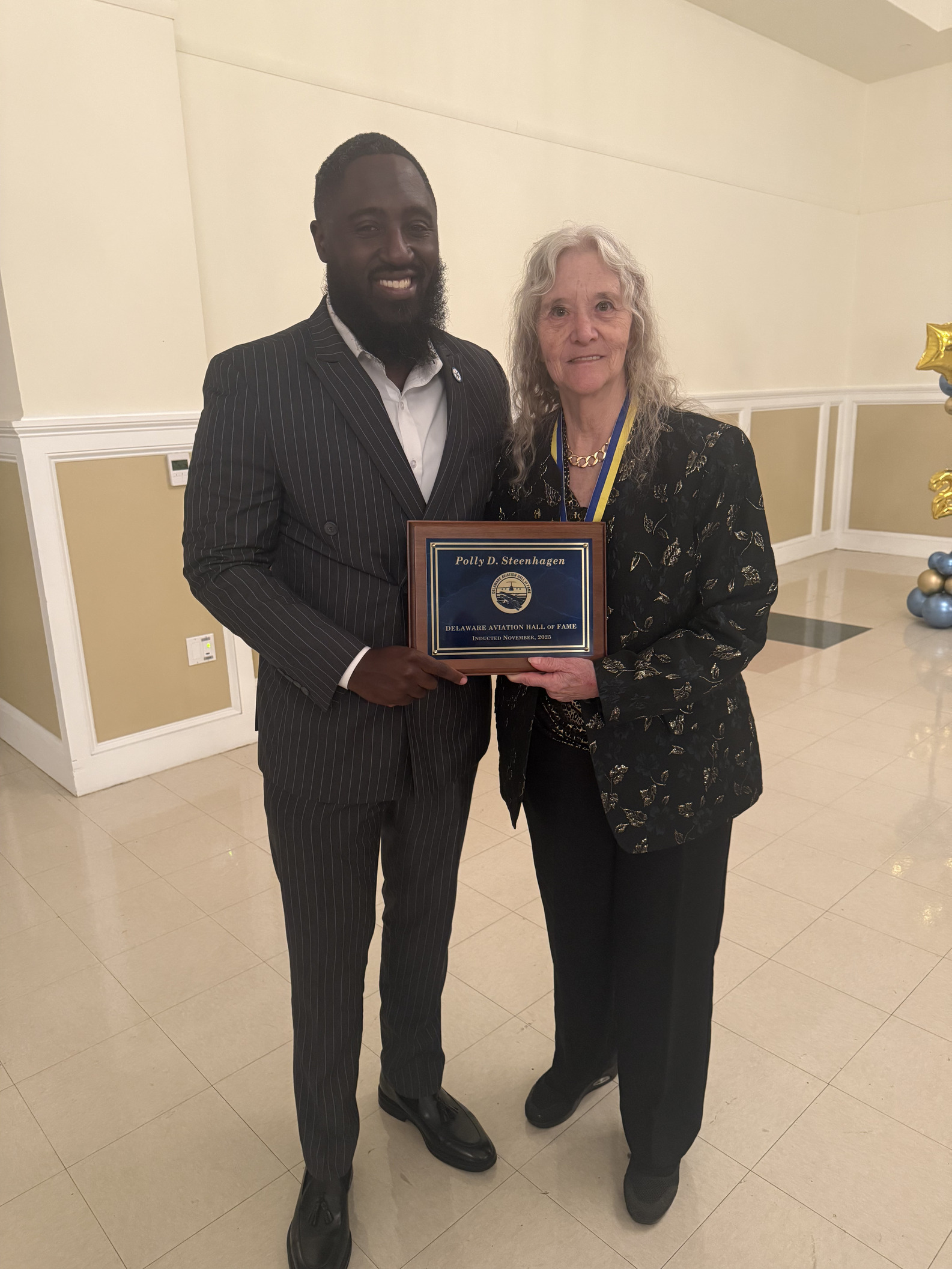 Dr. Polly Steenhagen with Kelvin Lesene, her former student and now DSU’s aviation director.