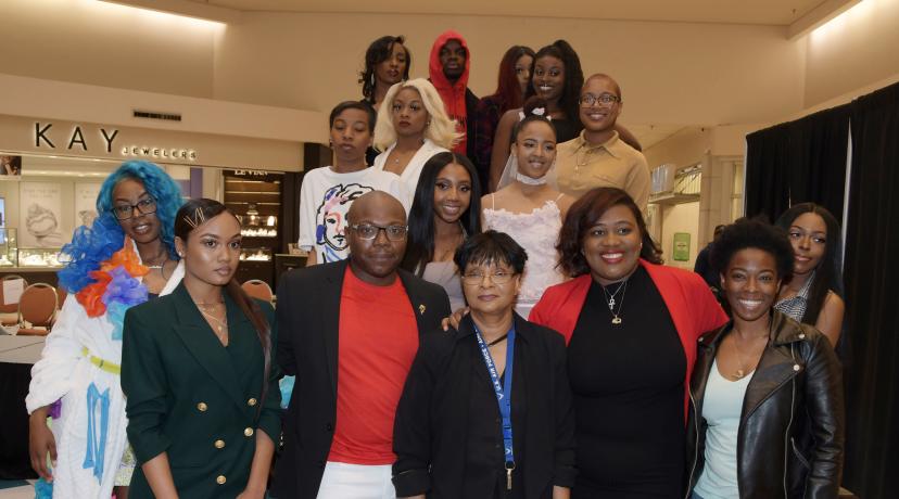 <p>These Textile and Apparel Studies students showed off their fashion designing creations during a April 27 show at the Dover Mall. Dr. Damayanthie Eluwawalage, assistant professor, (bottom row, third from the left), was so impressed by their work, she persuaded the Dover Mall executives to allow student to put on a fashion show there for the public.</p>
